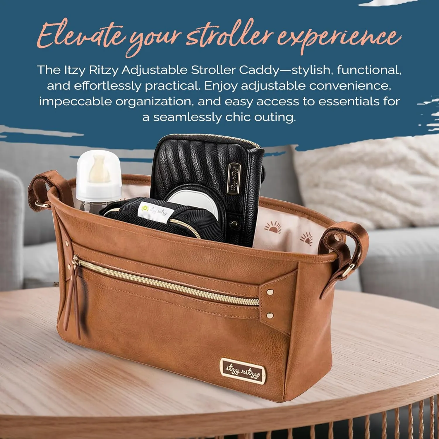 Itzy Ritzy Adjustable Stroller Caddy and Organizer Bag Featuring Front Zippered Pocket, 2 Built-in Interior Pockets & Adjustable Straps to Fit Nearly Any Stroller (Cognac)