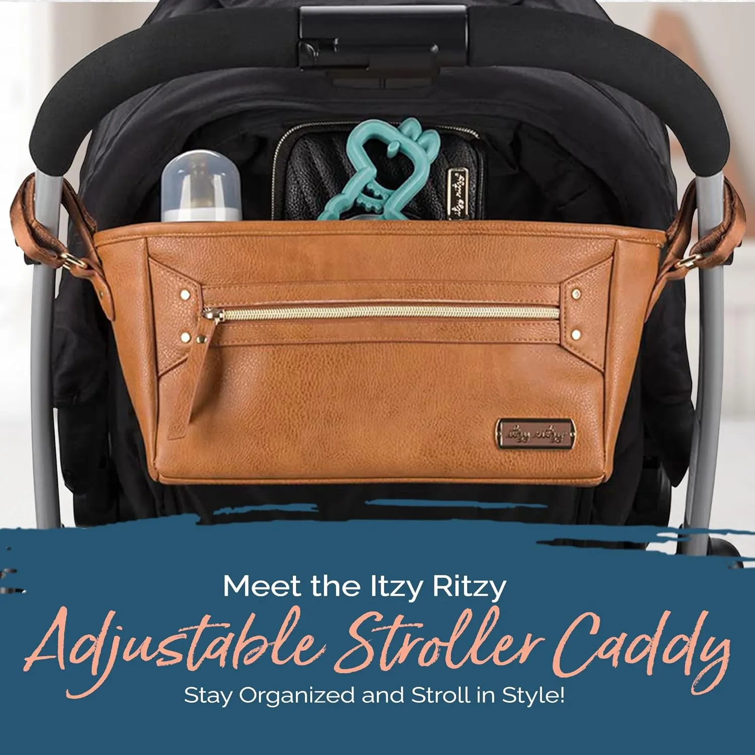 Itzy Ritzy Adjustable Stroller Caddy and Organizer Bag Featuring Front Zippered Pocket, 2 Built-in Interior Pockets & Adjustable Straps to Fit Nearly Any Stroller (Cognac)