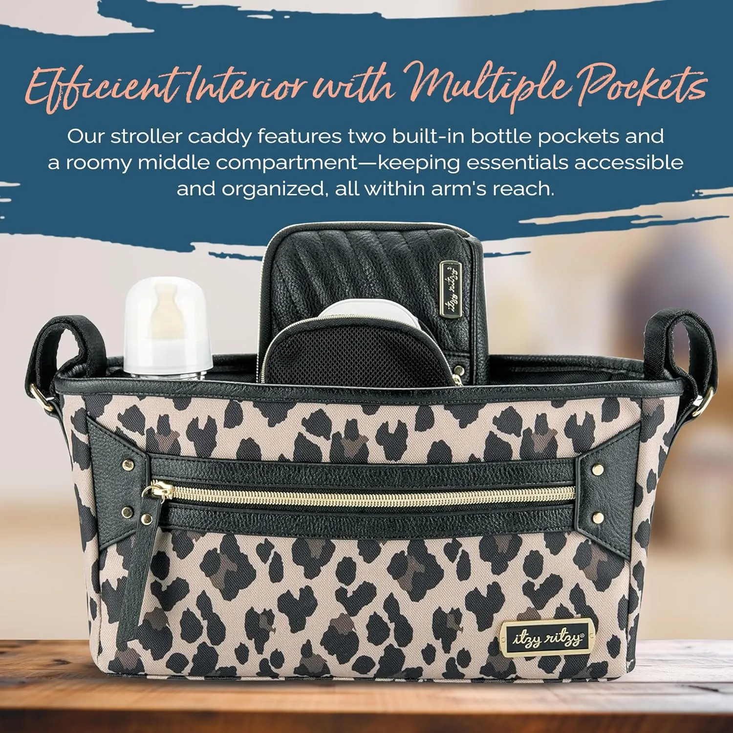 Itzy Ritzy Adjustable Stroller Caddy and Organizer Bag Featuring Front Zippered Pocket, 2 Built-In Interior Pockets & Adjustable Straps to Fit Nearly Any Stroller (Leopard)