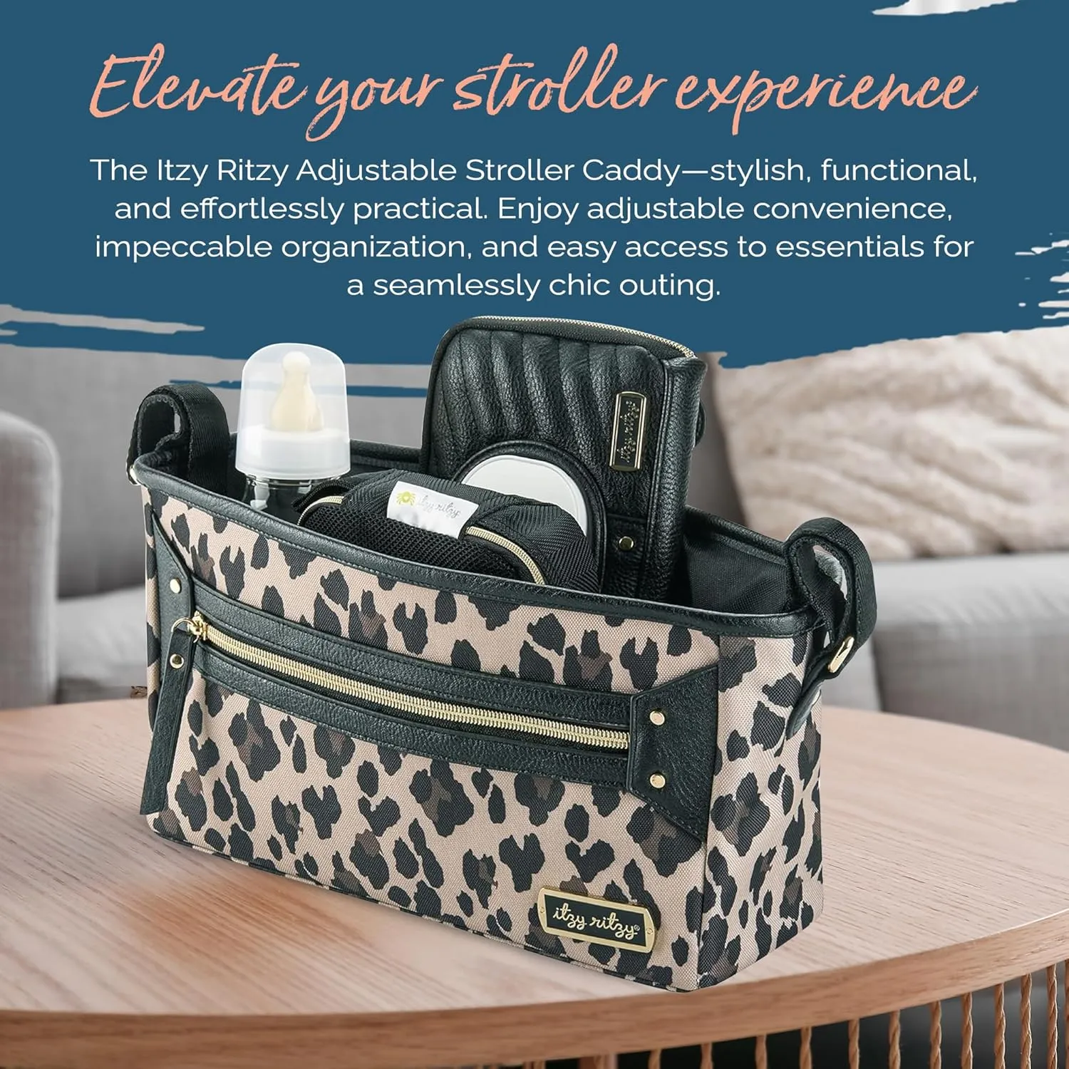 Itzy Ritzy Adjustable Stroller Caddy and Organizer Bag Featuring Front Zippered Pocket, 2 Built-In Interior Pockets & Adjustable Straps to Fit Nearly Any Stroller (Leopard)