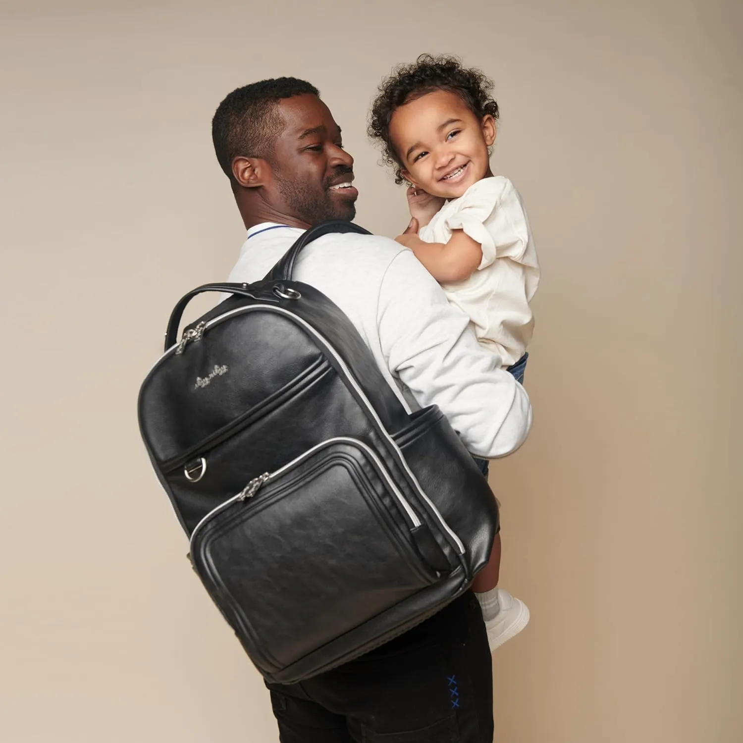 Itzy Ritzy Diaper Bag Backpack – Large Capacity Boss Plus Baby Backpack Diaper Bag Featuring 19 Pockets, Changing Pad, Stroller Clips, and Comfortable Backpack Straps, Black with Silver Hardware