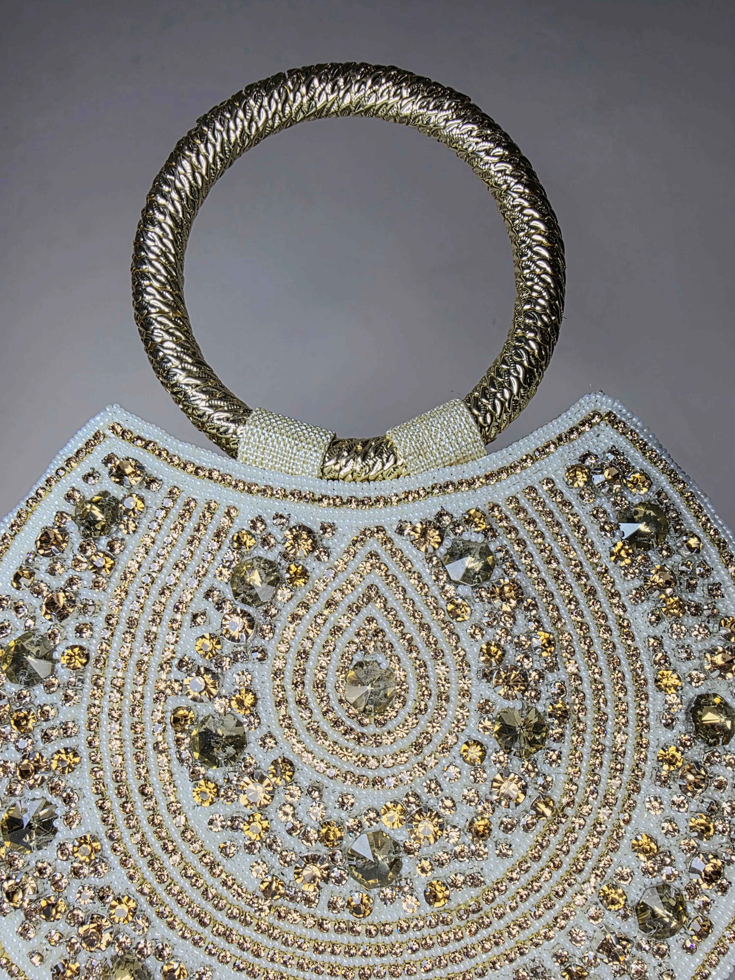 Radiant Ring Handle Embellished Clutch