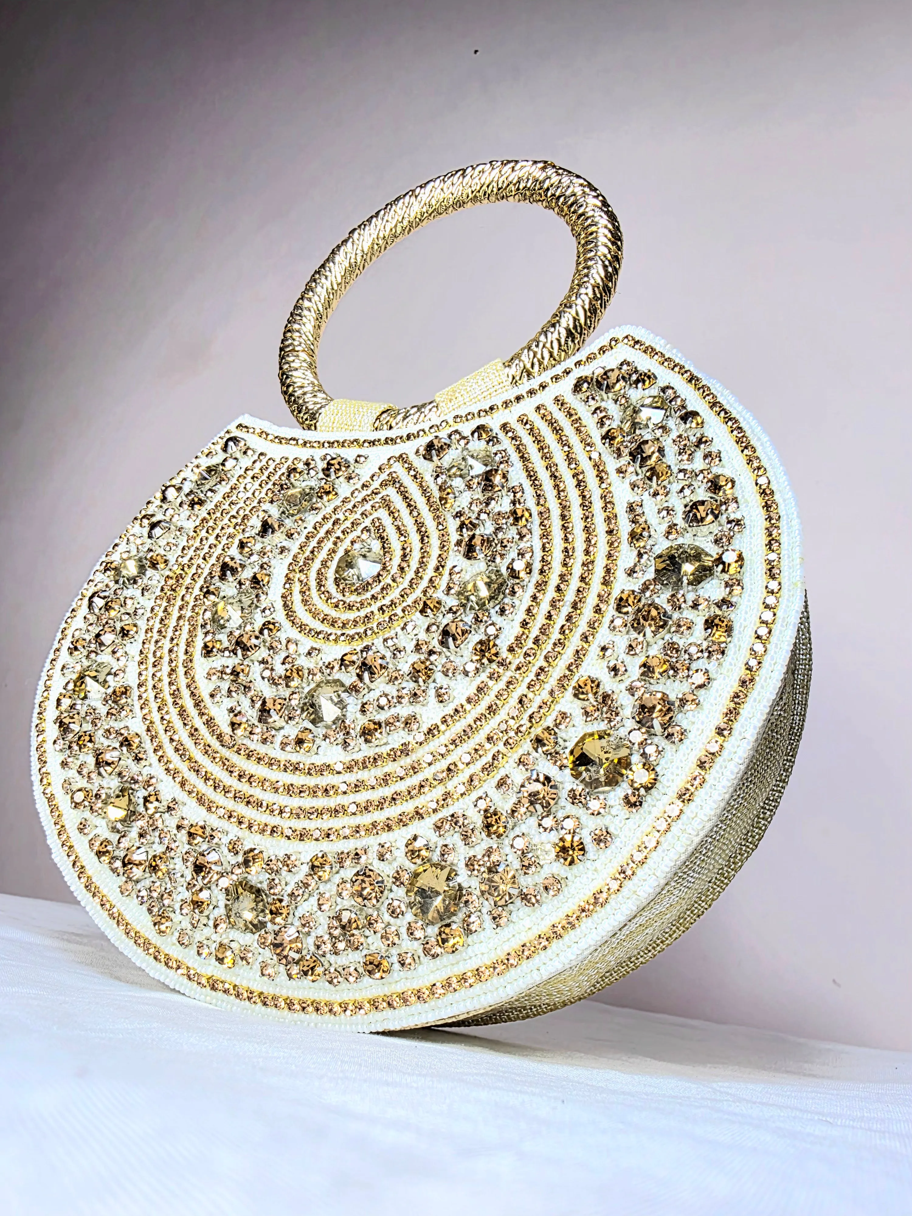 Radiant Ring Handle Embellished Clutch