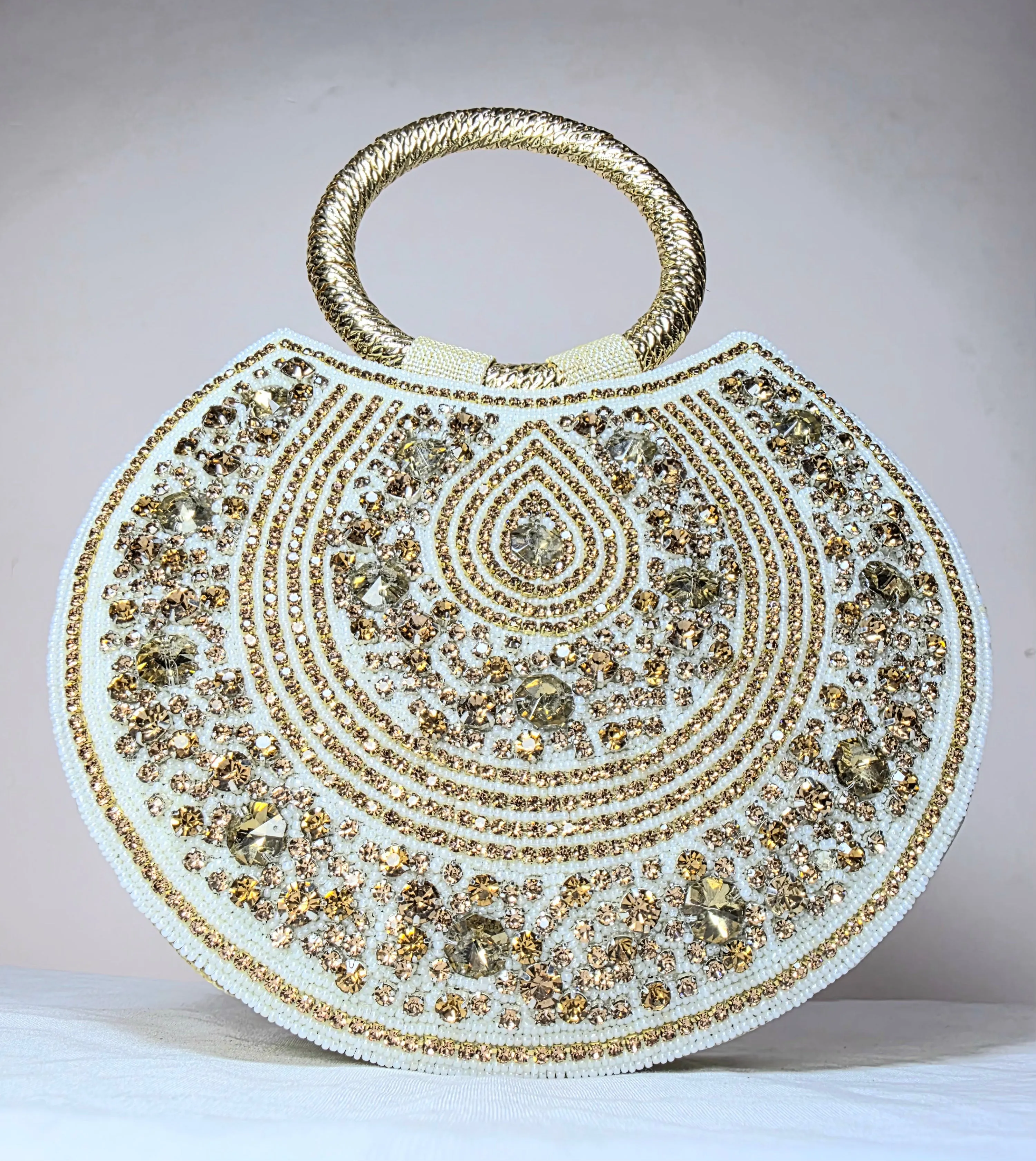 Radiant Ring Handle Embellished Clutch