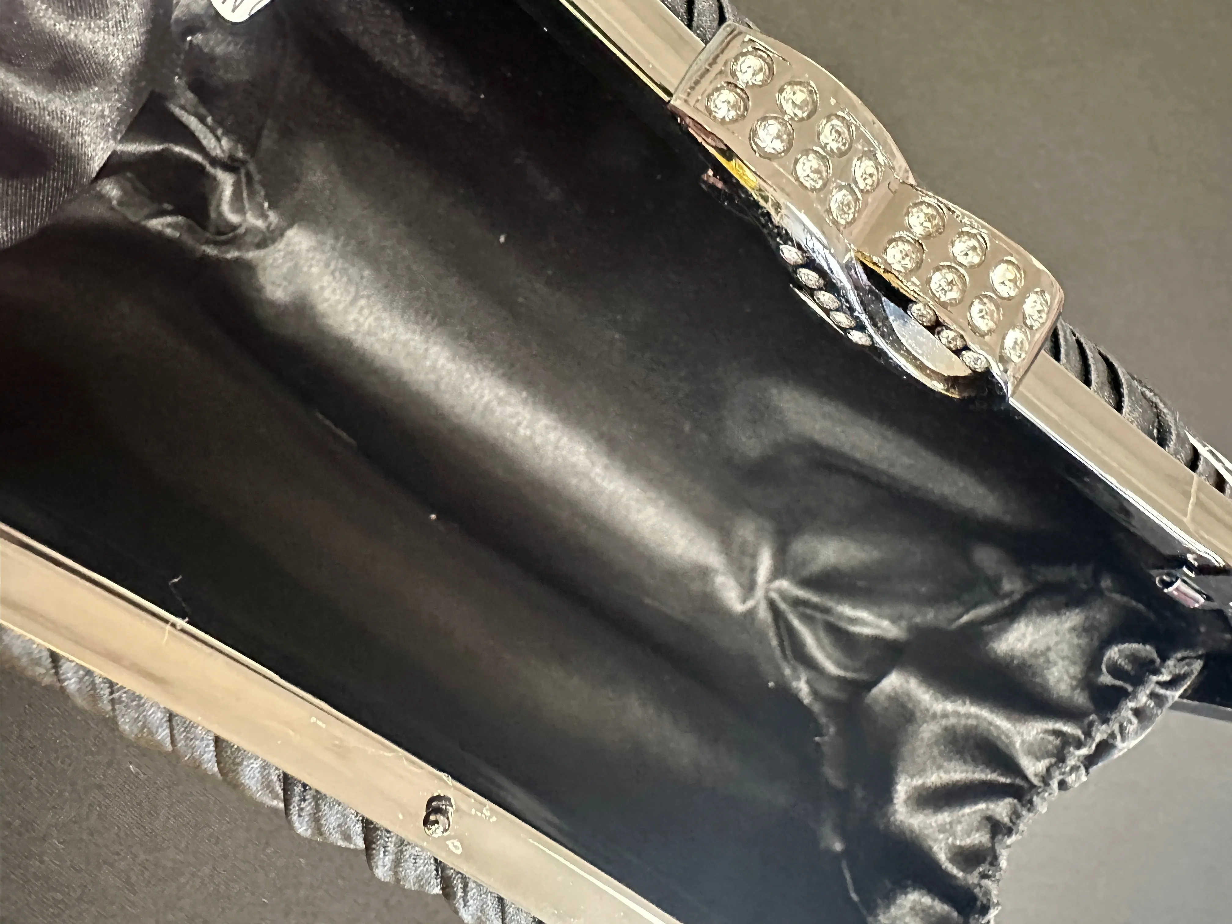 Satin black evening clutch